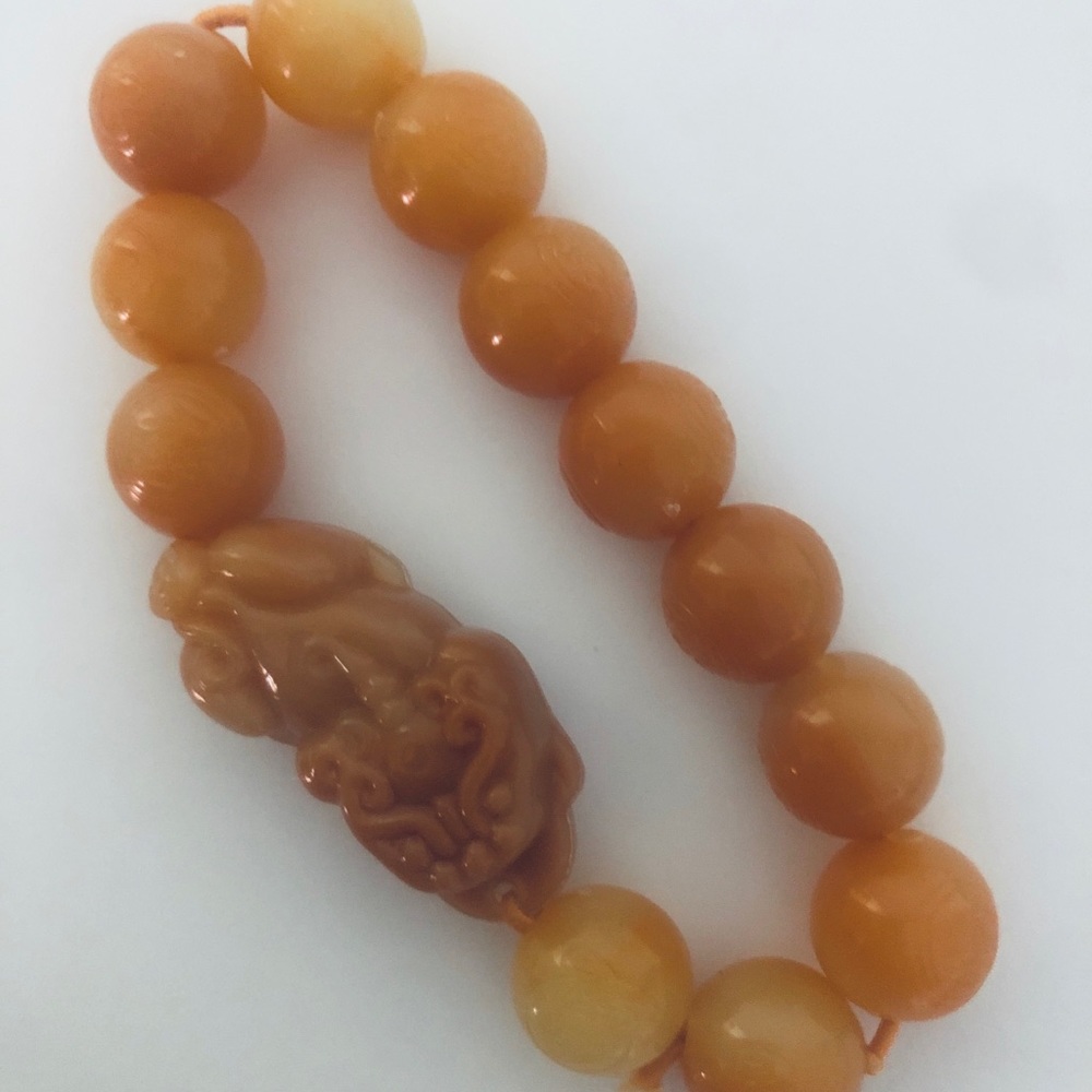 Woman’s Asian Handcrafted Round Bead Strand Bracelet With Carved Charm